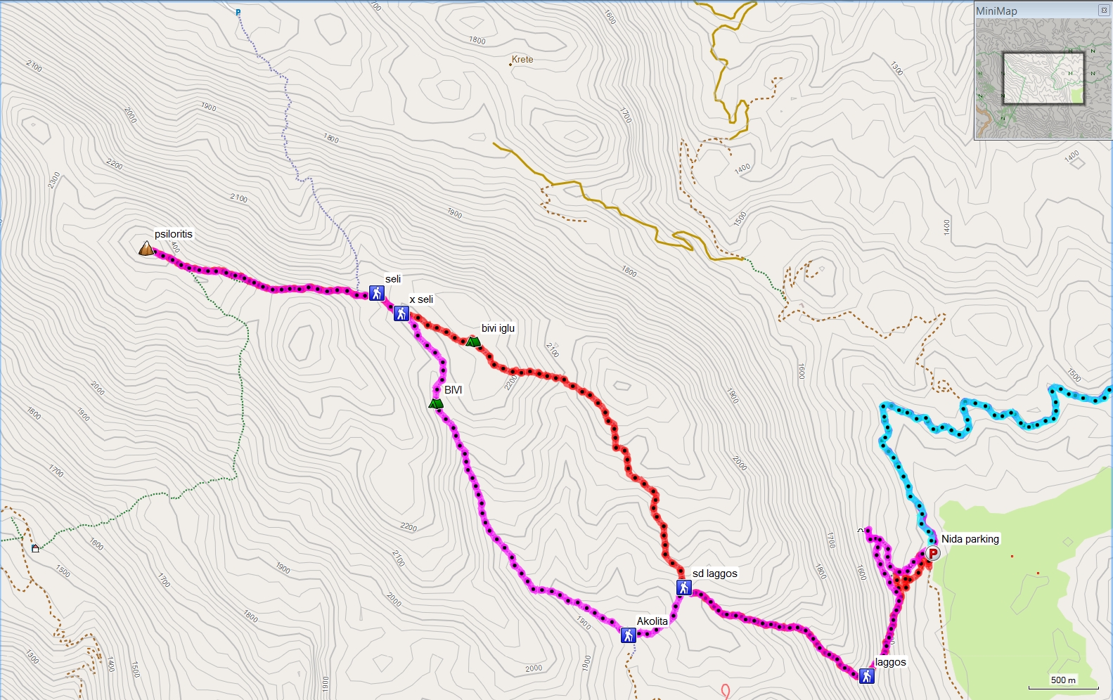 Psiloritis - výlet so Stefanynkou, jún 2016. Modrá je prístupová cesta autom od Anogie. Červenou som vystupoval na Psiloritis a fialková je zostupová trasa z Psiloritisu k autu na planinu Nida. Sľučka vľavo pred parkoviskom vedie k jaskyni Ideo Andro. Vysvetlivky pre nasledujúce fotografie:  Laggos - ceduľka označujúca Laggos, sd Laggos - tyčka v sedle, odkiaľ sa výstupová trasa vetví smerom hore na Mitatu a dole do doliny Akolita, bivi iglu - Mitata, X Seli je rázcestie pod Seli, Seli - je sedlo Seli